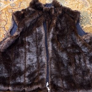 reversible faux fur vest from a brand Giacca it’s in almost new condition